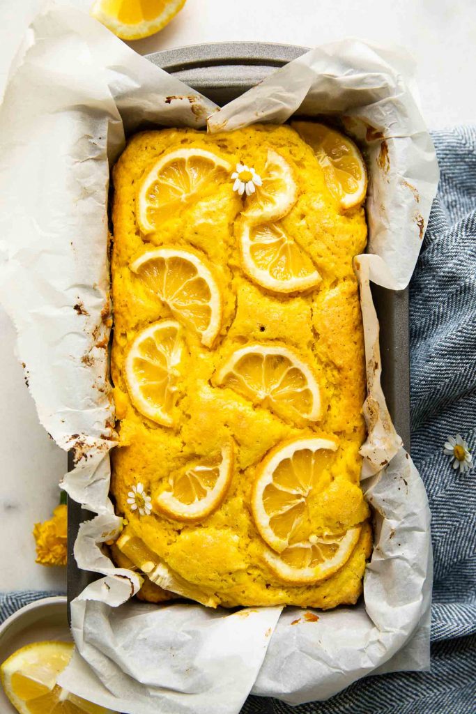 Top shot of lemon turmeric tea cake in a loaf pan.