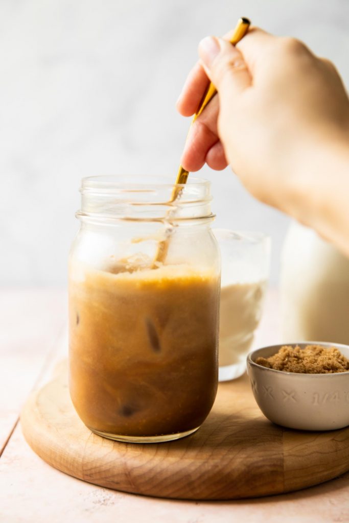Shake or stirred Iced Brown Sugar Oatmilk Shaken Espresso in a mason jar.
