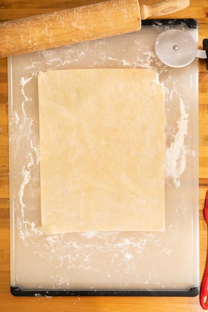Pastry dough rolled out into a rectangle.