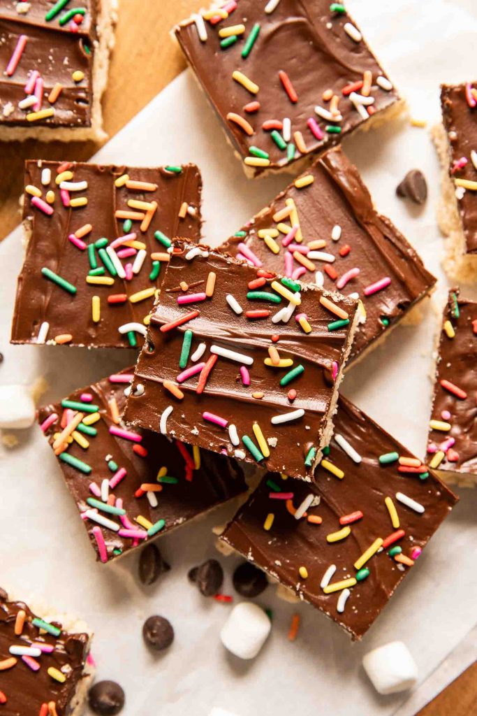 Chocolate Covered Rice Krispies Treats with dark chocolate and sprinkles.