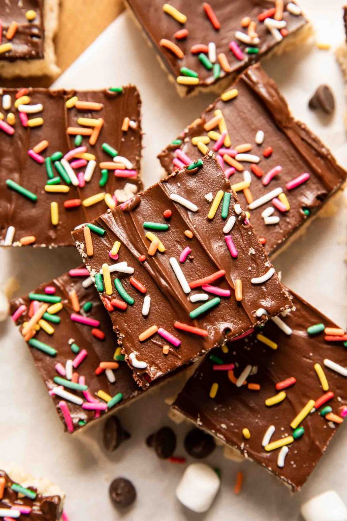 Close up of Chocolate Covered Rice Krispies Treats with sprinkles.