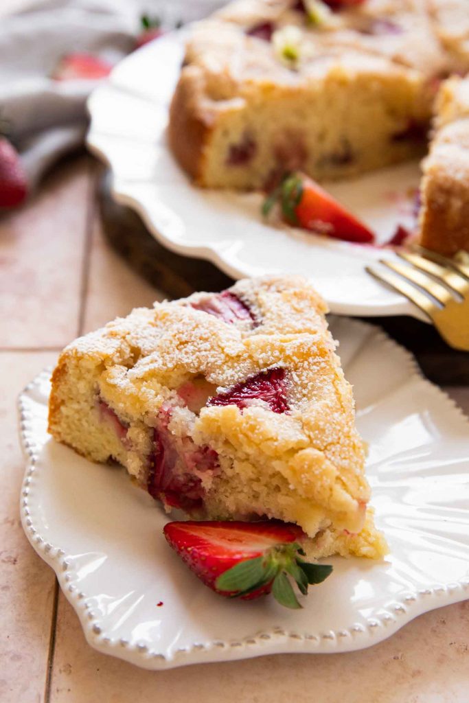 Slice of french cake with strawberries.