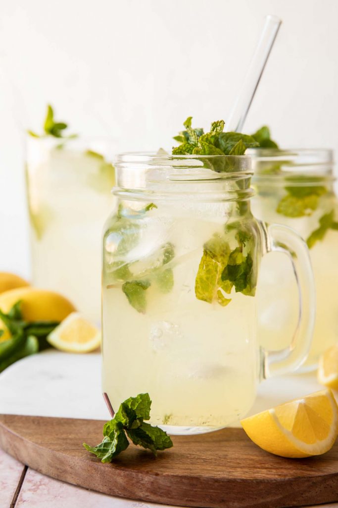 Close up of mint lemonade recipe in a glass jar.