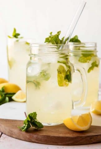Mint lemonade in jars with straws.