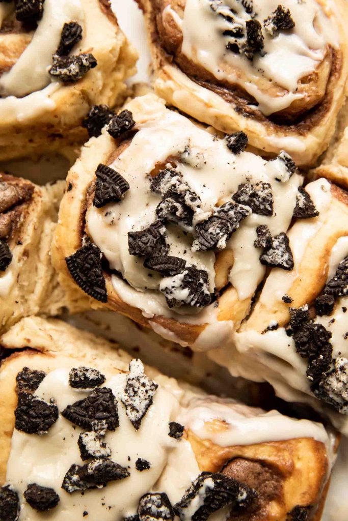 Close up of Cookies & Cream Cinnamon Rolls with oreos.
