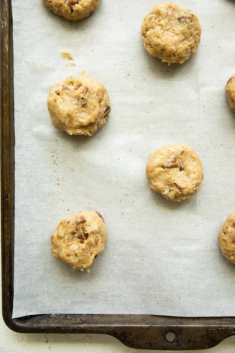 Raw cookie dough on a baking sheet.
