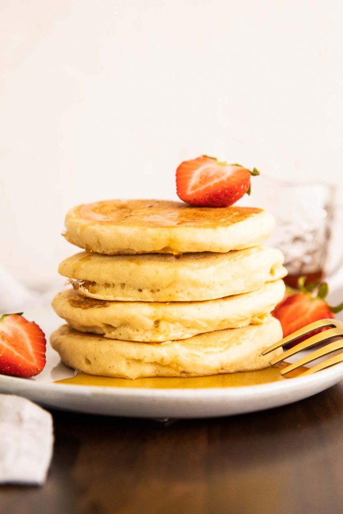 Stack of self-rising flour pancakes on a plate.