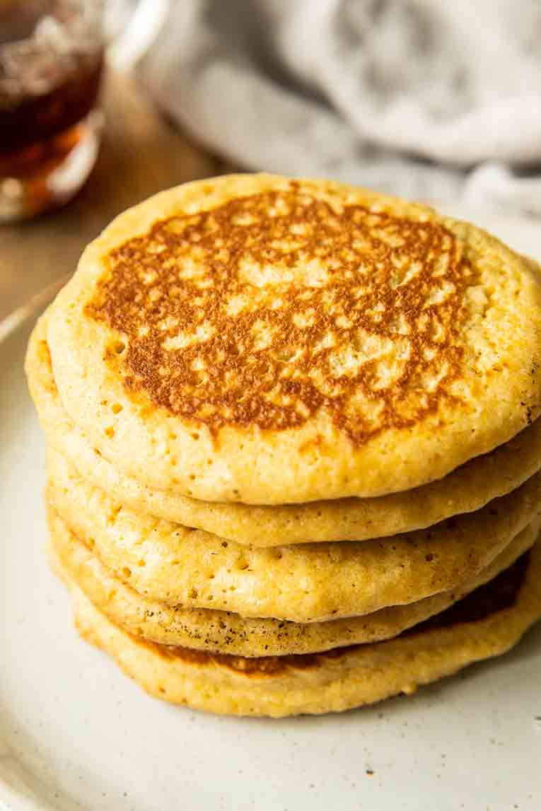 Pancakes made with cornbread mix or cornmeal.