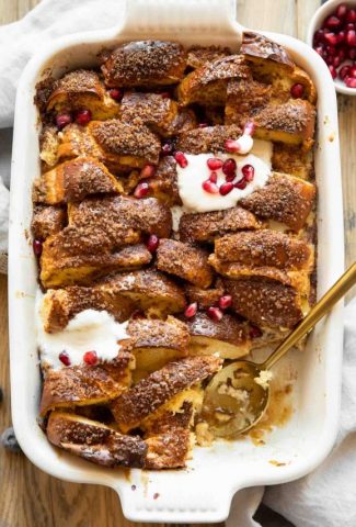 Brioche French Toast Casserole with a spoon.