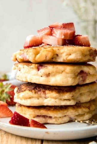 Close up of stack of Strawberry Pancakes Recipe.