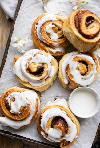 Small-Batch Cinnamon Rolls on a baking sheet with icing.