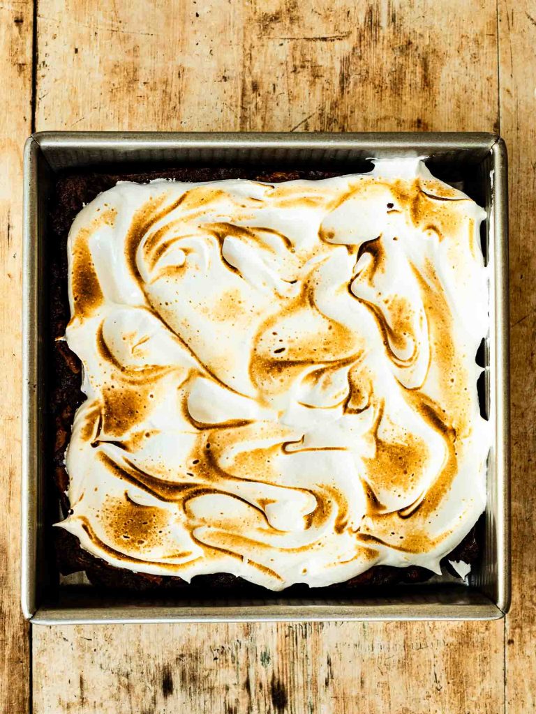 Brownies topped with toasted meringue.