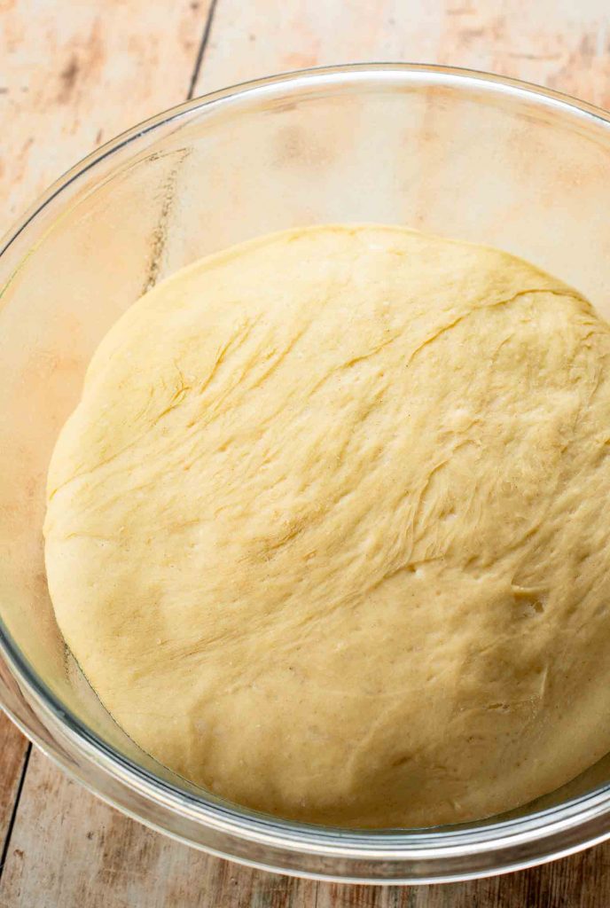 Homemade dough in a large bowl.
