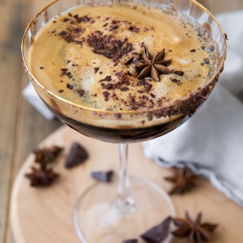 Angled close up of Chocolate Espresso Martini with star anise.
