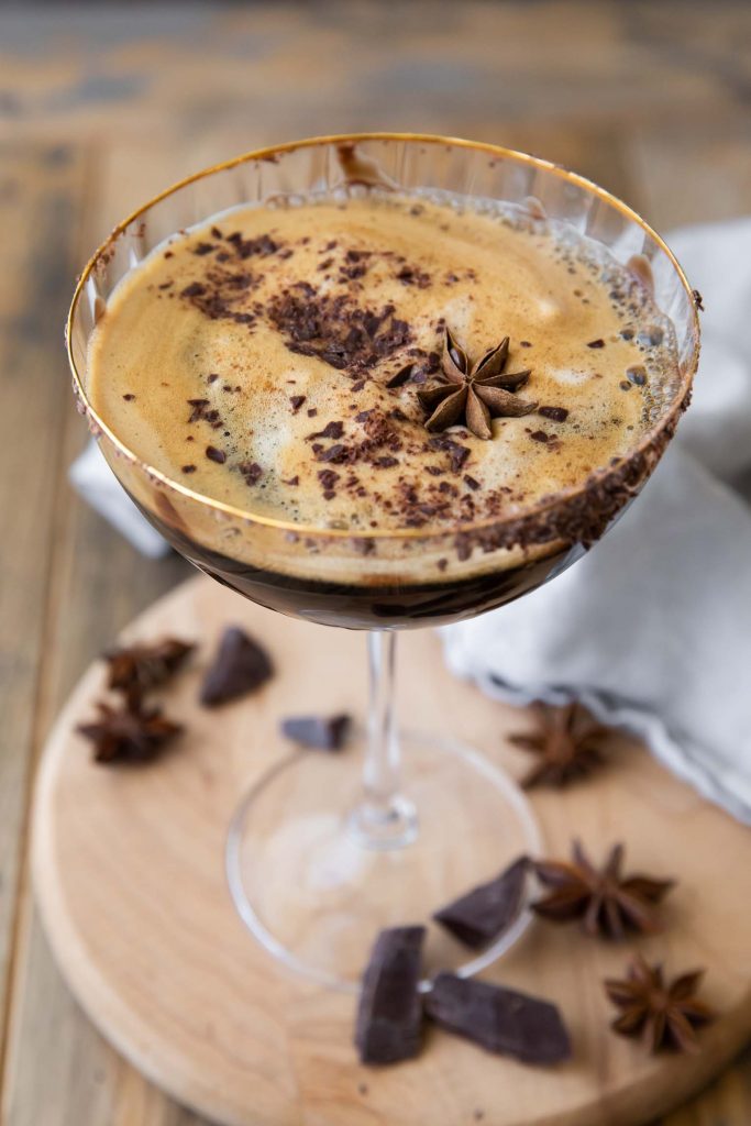 Angled close up of Chocolate Espresso Martini with star anise.