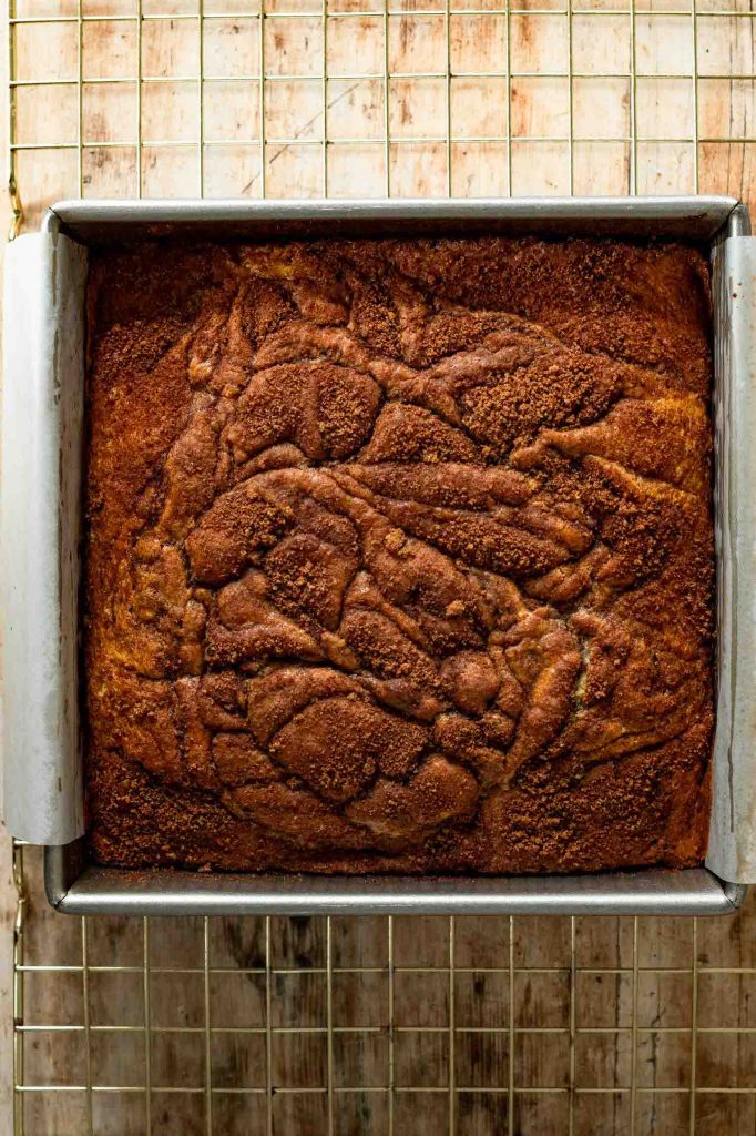 Freshly baked Snickerdoodle cake in a cake pan.
