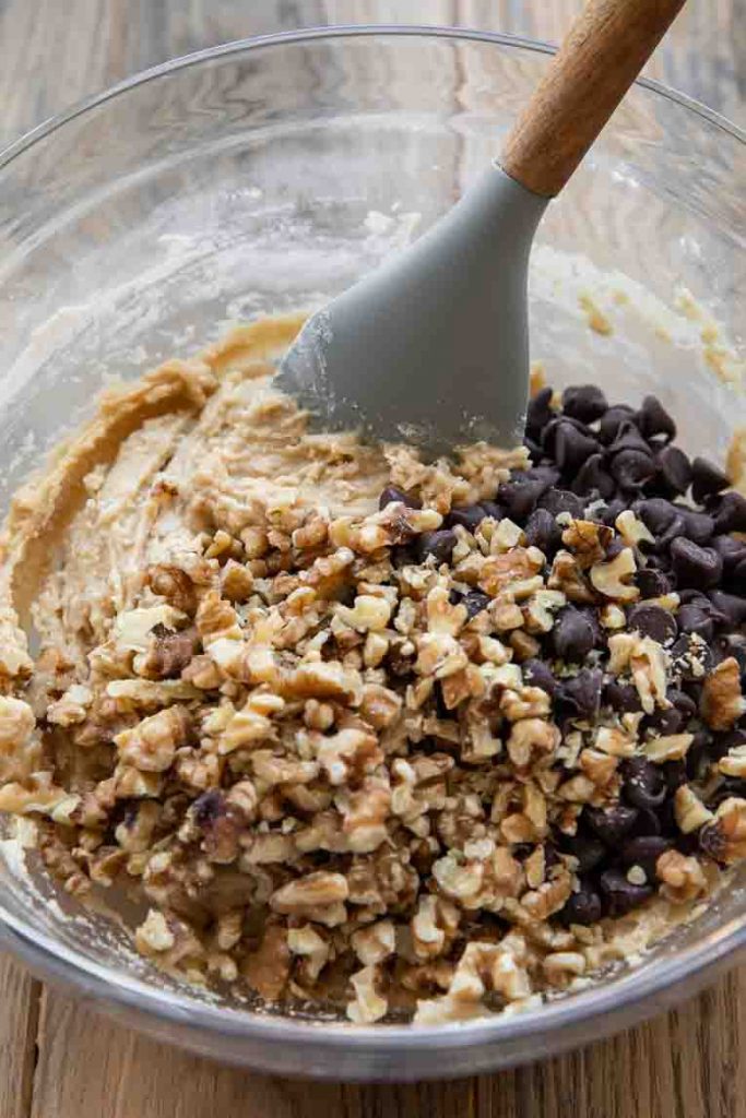 Chocolate chips and chopped walnuts mixed into cookie dough.