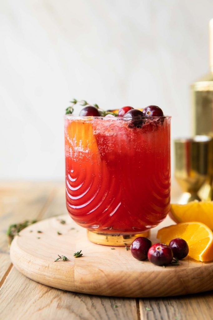 Across photo of Cranberry Orange cocktail with ginger beer.