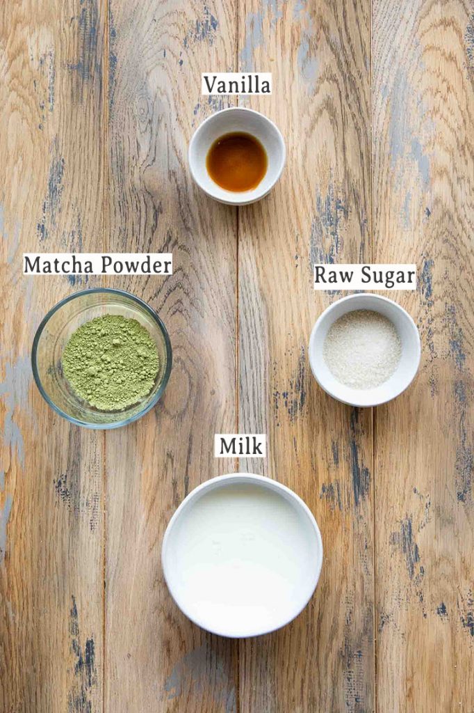 Ingredients for vanilla matcha latte recipe.