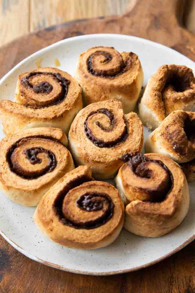 Cooked Air Fryer Cinnamon Rolls cooling.