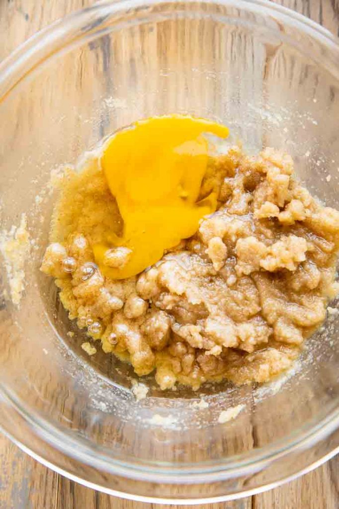 Egg added to liquid ingredients for cookie batter.