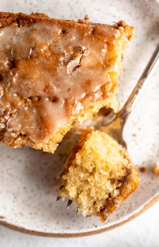 Close up of Honeybun Cake with a bite taken out.