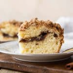 Close up of coffee cake slice with streusel topping.