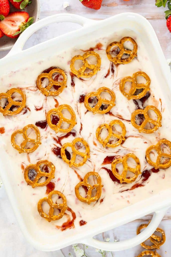 Top photo of Strawberry Pretzel Dessert bars in a pan.