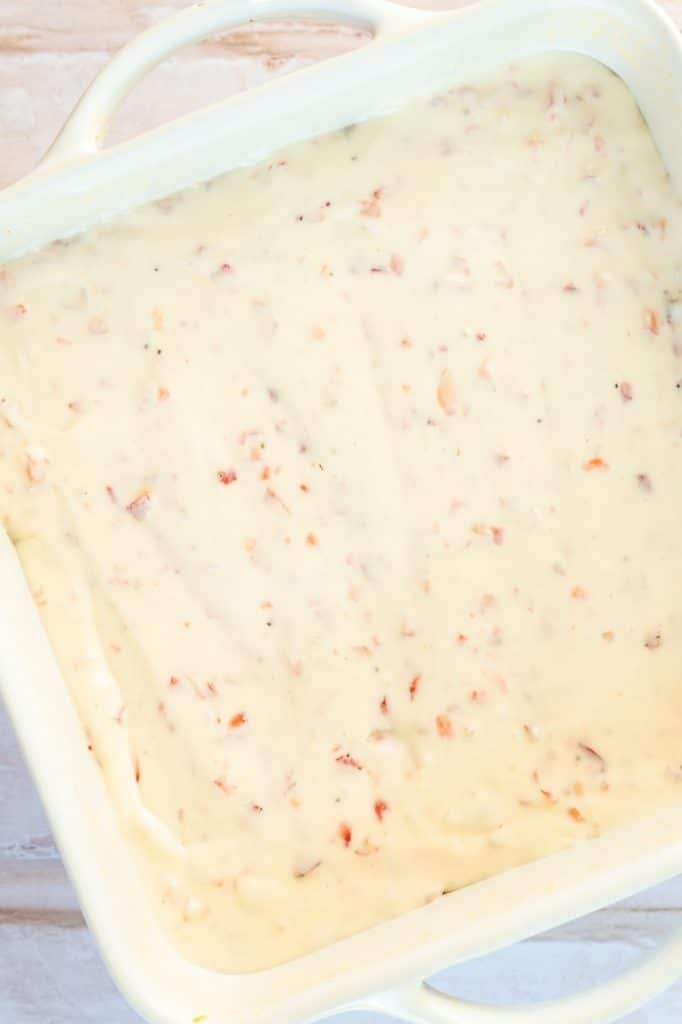 Filling added to pretzel crust in pan.