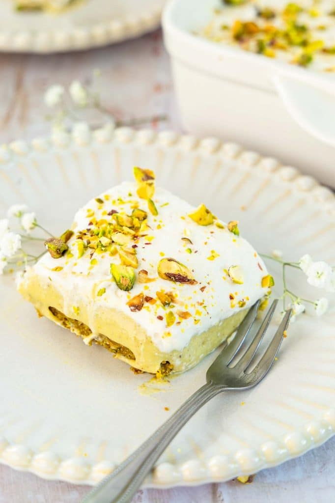 Pistachio Pudding Dessert on a plate.