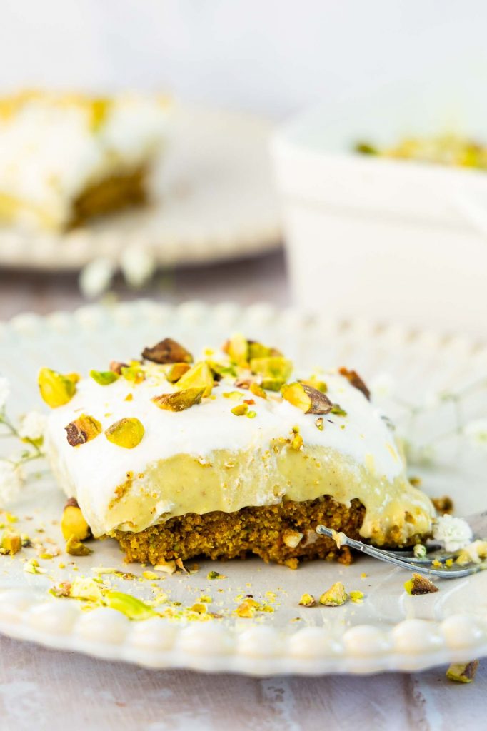 Layered no-bake Pistachio Dessert on a plate.