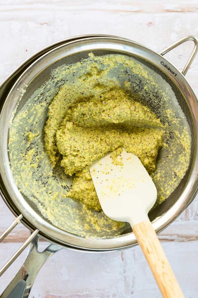 Pistachio paste in a bowl.