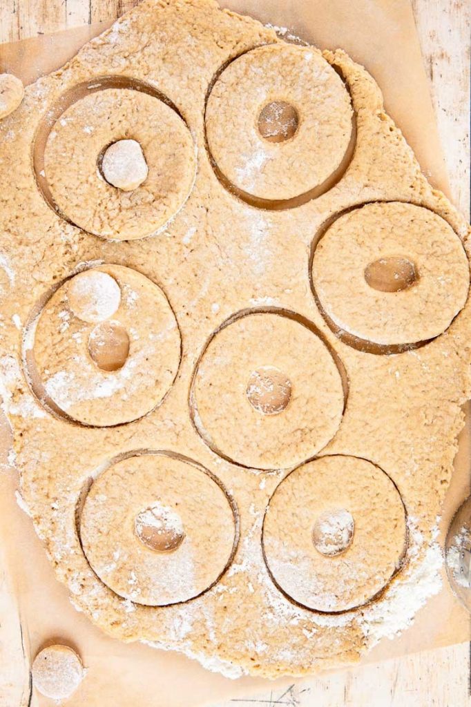Cake donut dough on a flat surface.