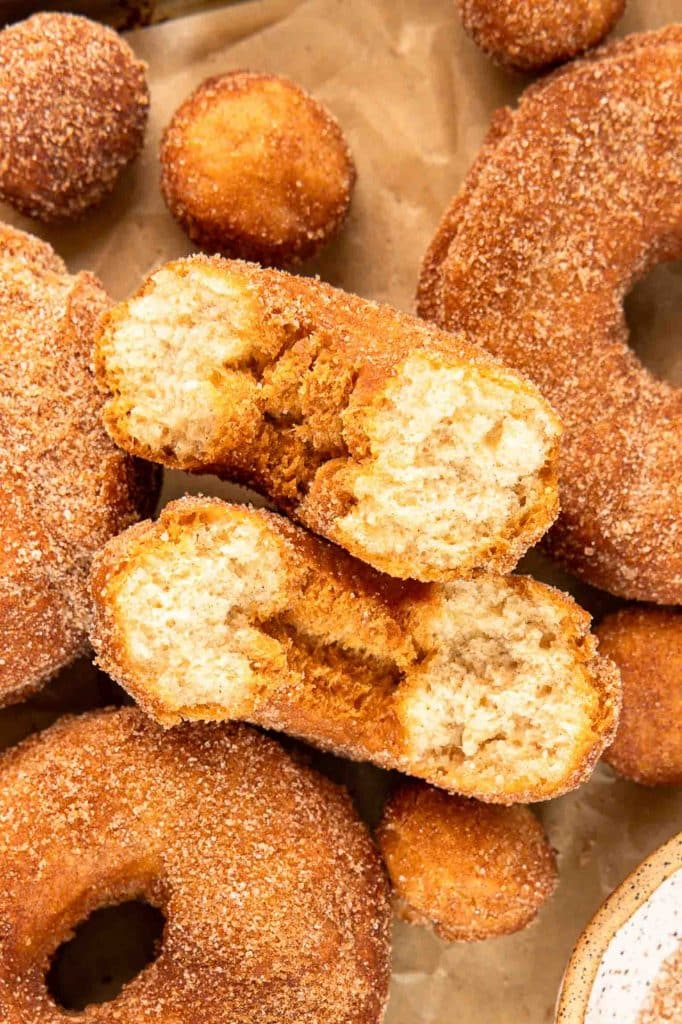 Cake donuts on a baking sheet.