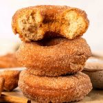 Cake donuts stacked on top of each other.