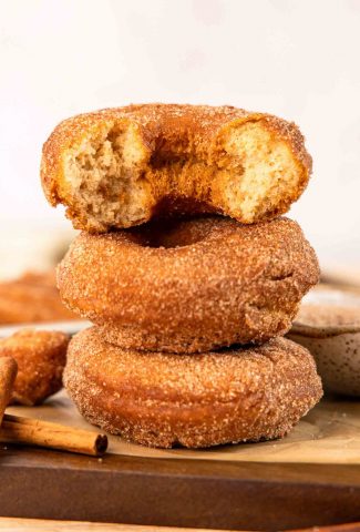 Cake donuts stacked on top of each other.