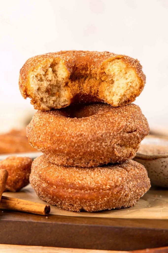 Cake donuts stacked on top of each other.