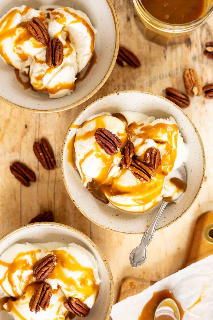 Caramel sauce on vanilla ice cream.
