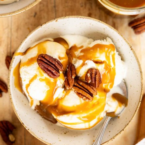 Caramel sauce on vanilla ice cream.