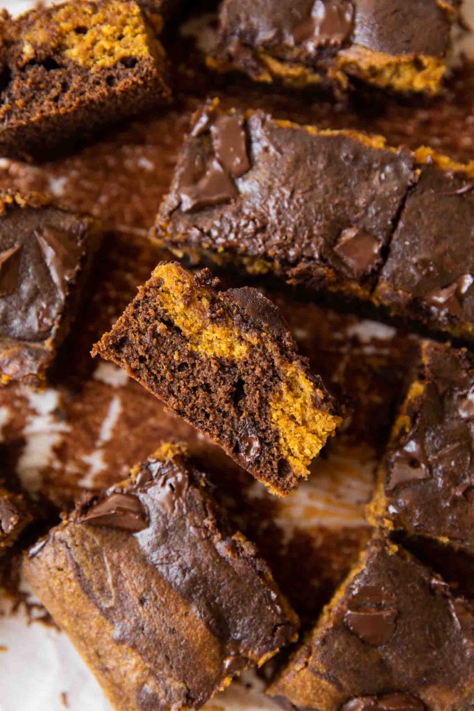 Pumpkin brownies cut into squares.