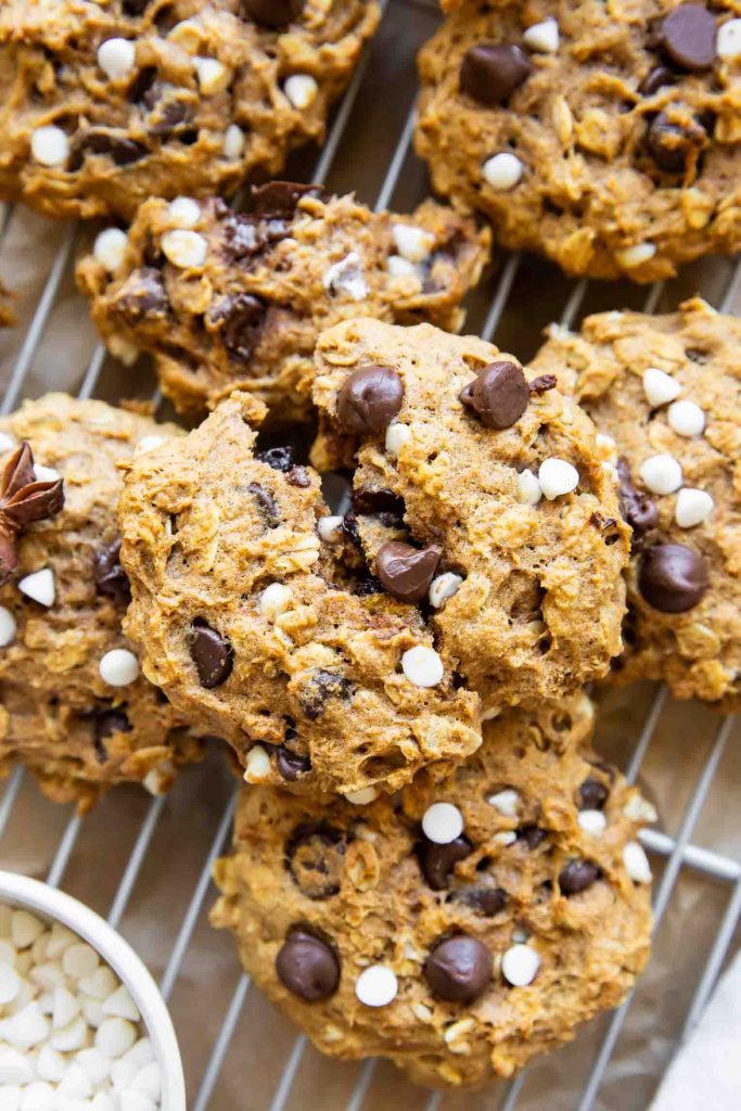Pumpkin oatmeal cookies on a cooling rack.