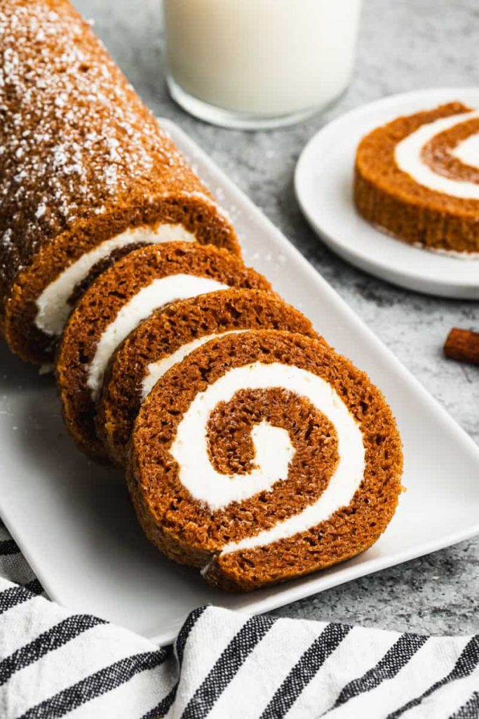 Pumpkin roll served on a platter.