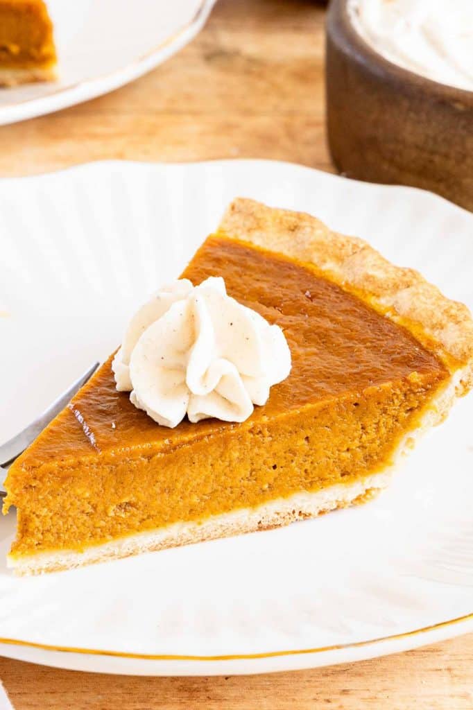 Angled view pumpkin pie slice.