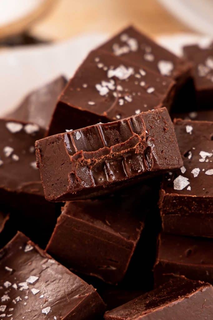 Close up image of a bite taken out of Dark Chocolate Fudge.