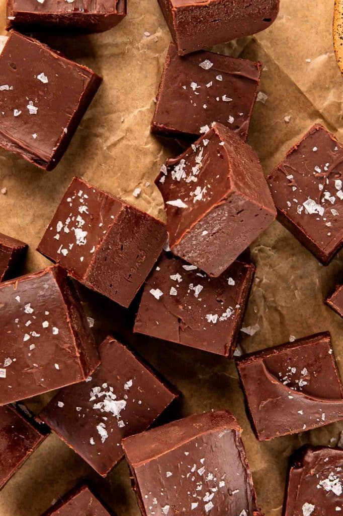 Dark Chocolate Fudge on a wooden surface.