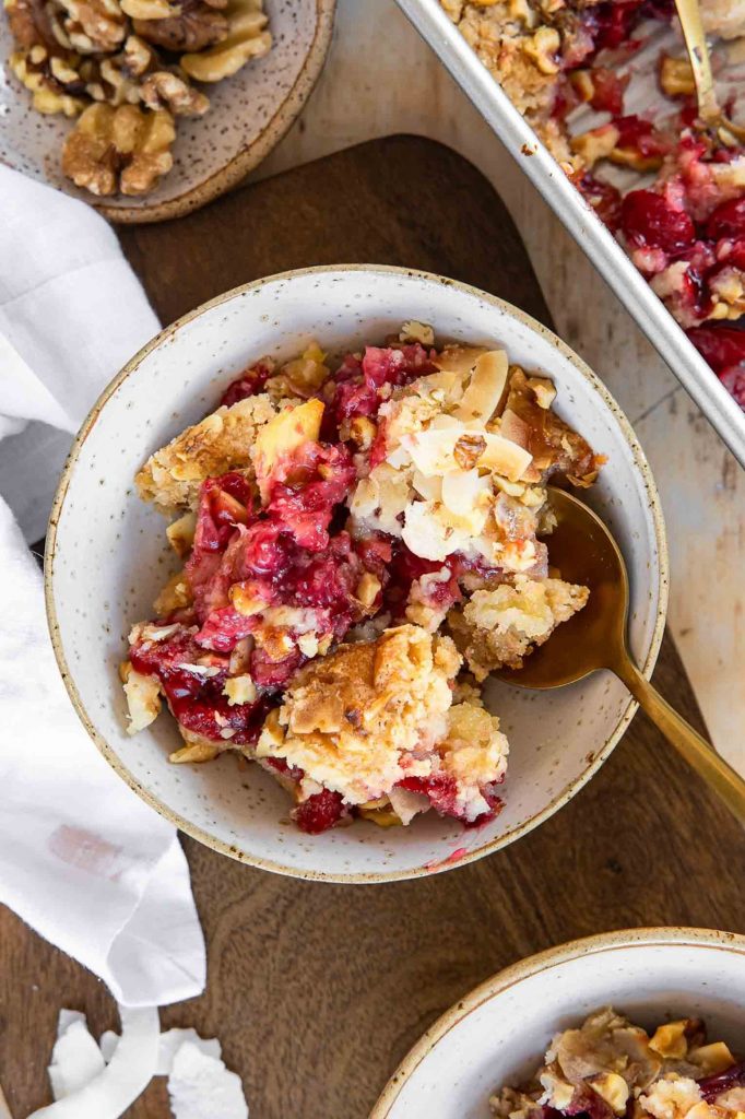 cherry pineapple dump cake in a bowl.