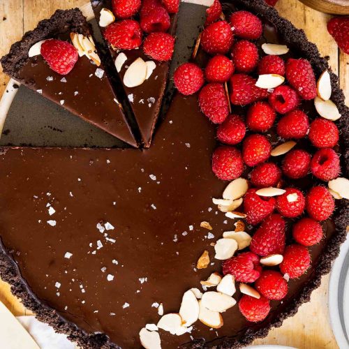 Chocolate tart in a round pan.