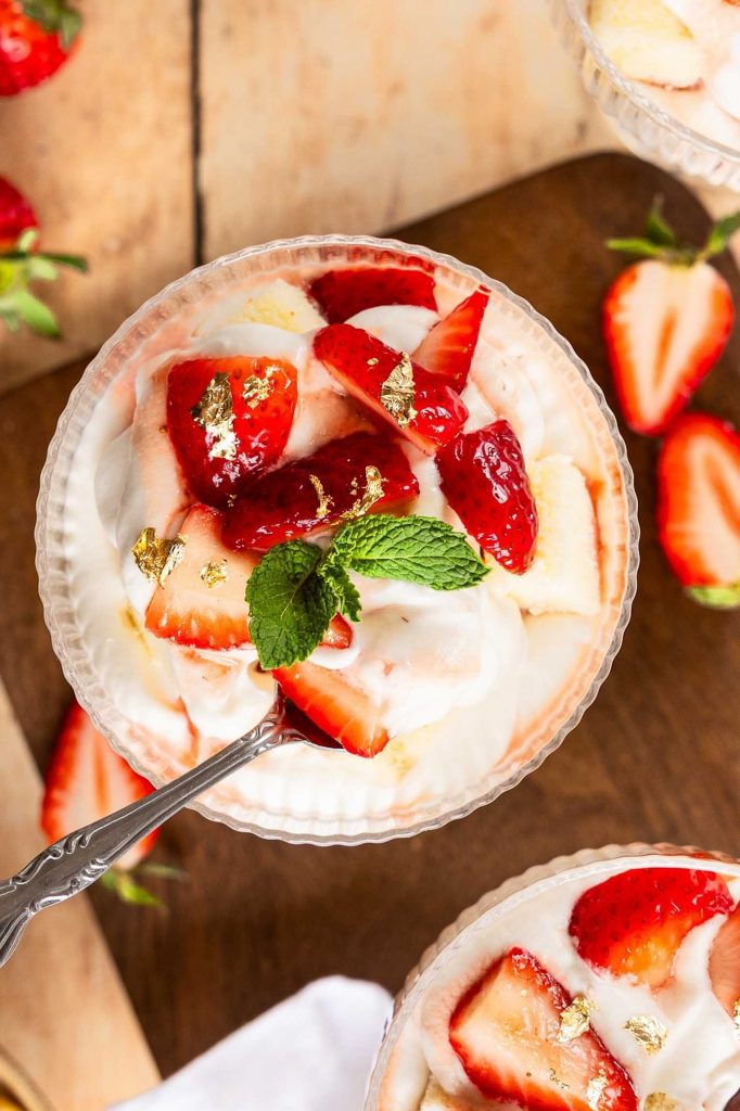 Top view of Strawberries and Cream dessert in a dessert cup.
