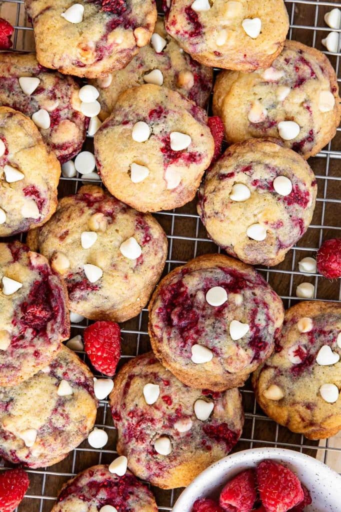 Raspberry cookies on a cooling rack.