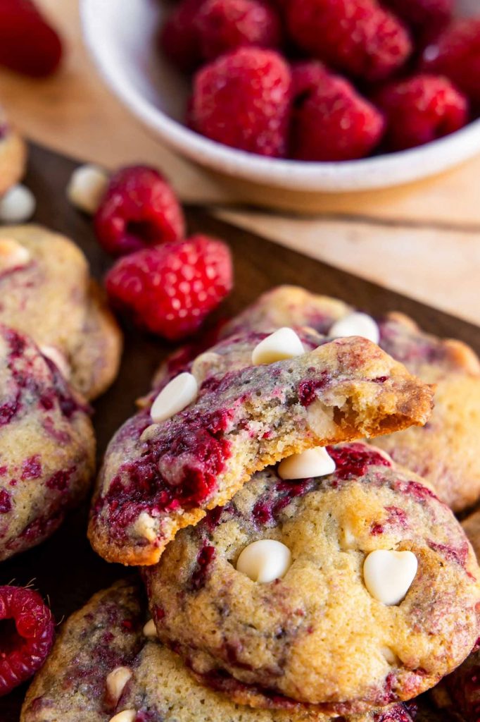 Raspberry cookies on a flat surface.